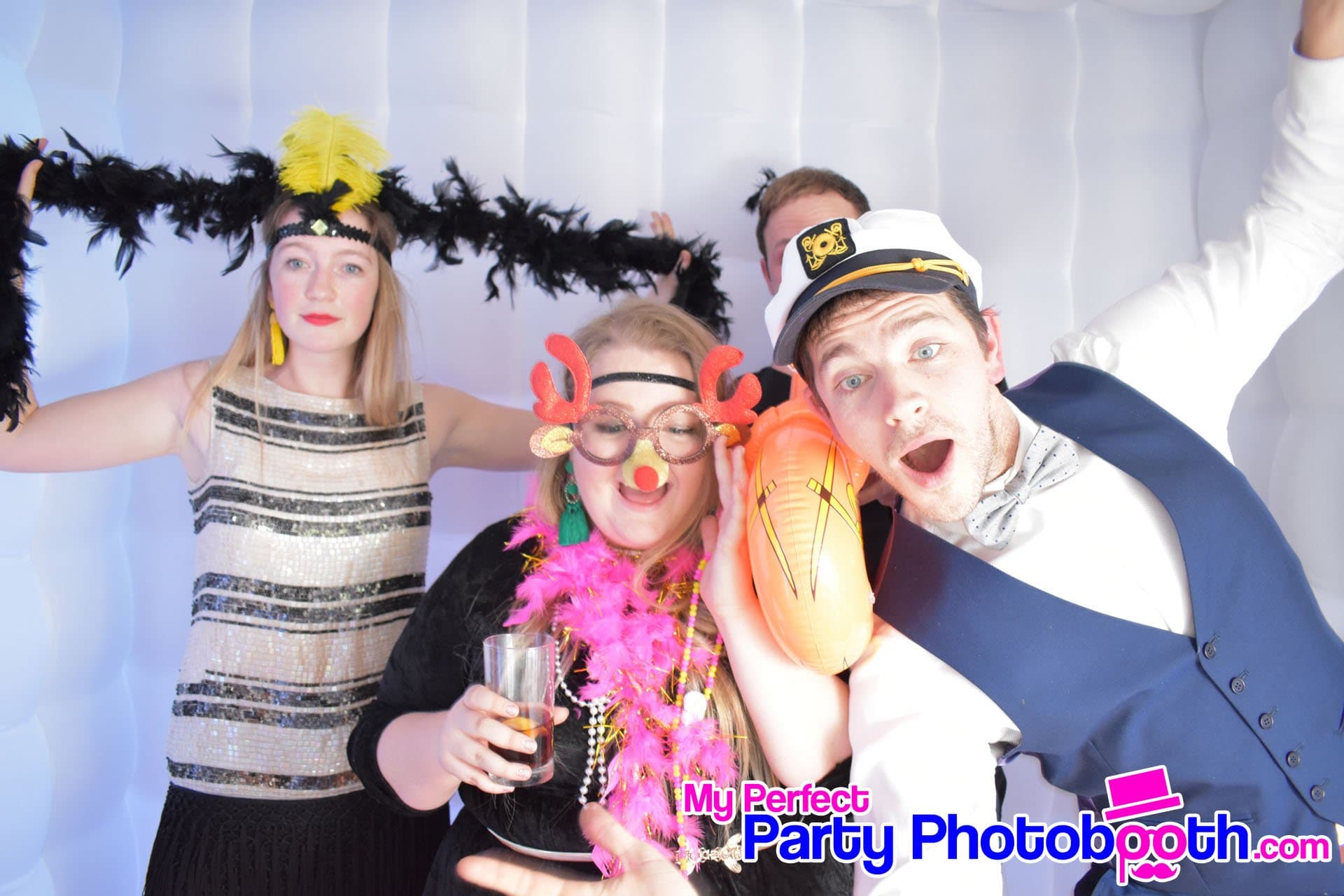 Guests at a Roaring 1920s-themed Christmas party