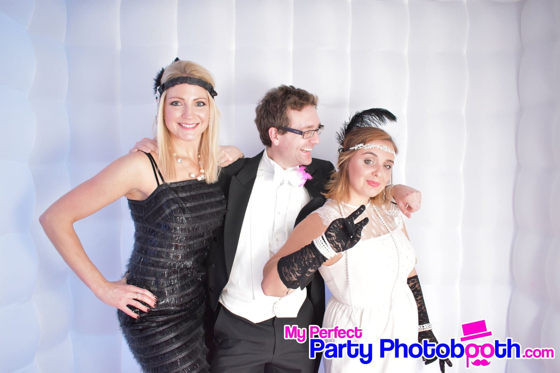 Guests at a Roaring 1920s-themed Christmas party