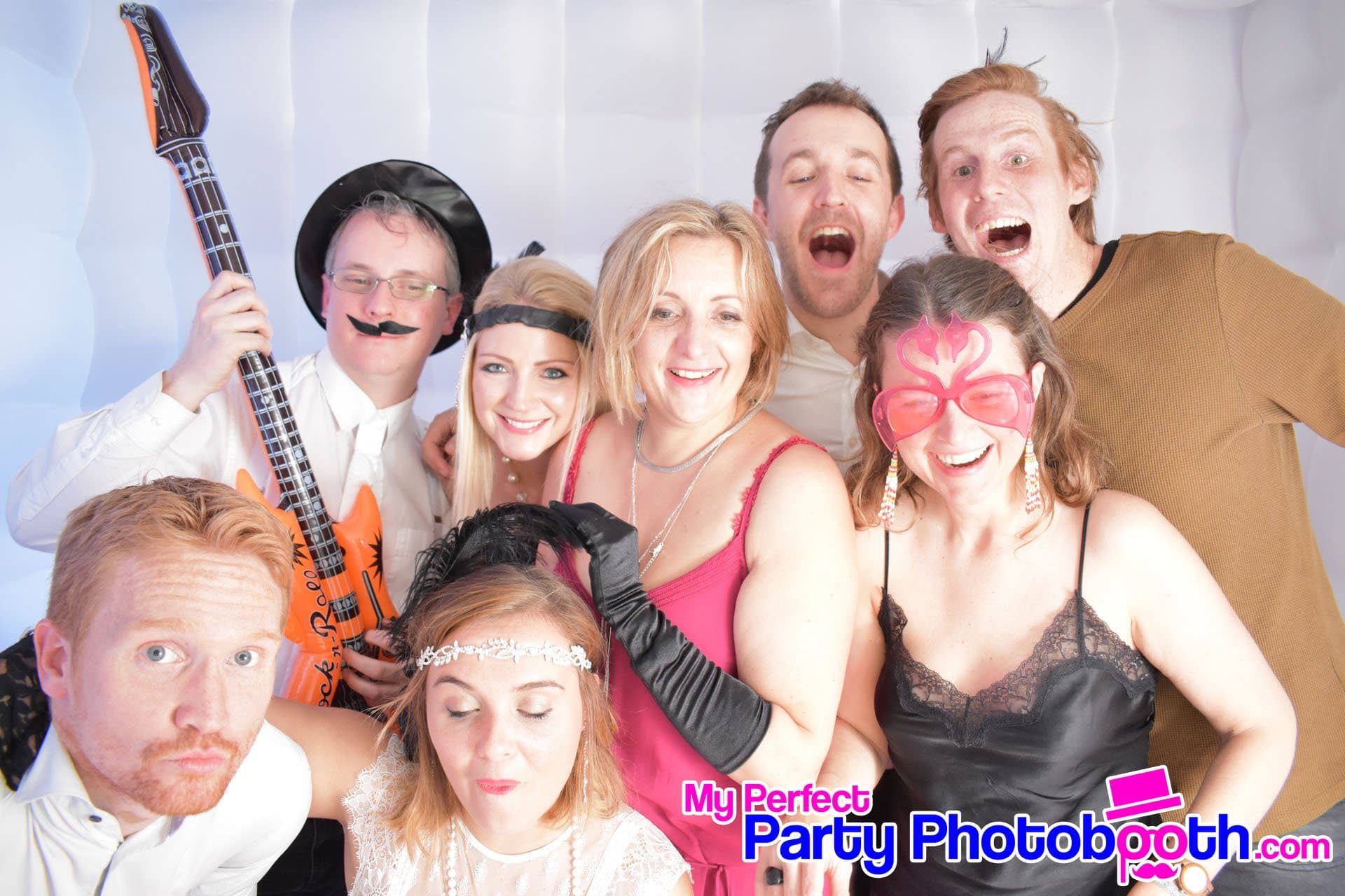 Guests at a Roaring 1920s-themed Christmas party