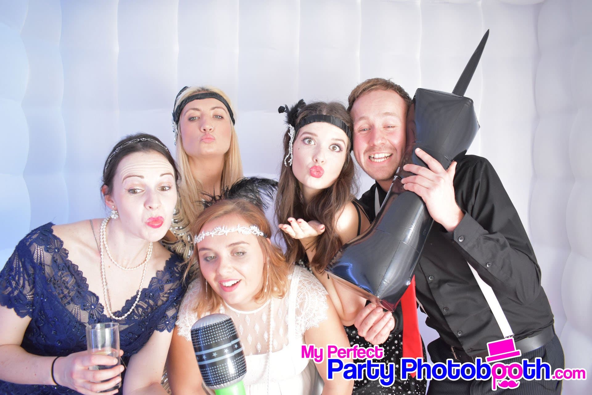 Guests at a Roaring 1920s-themed Christmas party