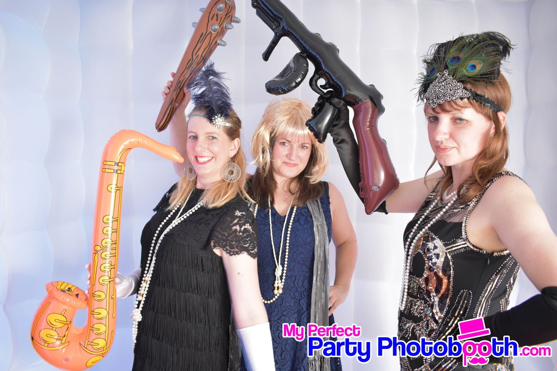 Guests at a Roaring 1920s-themed Christmas party