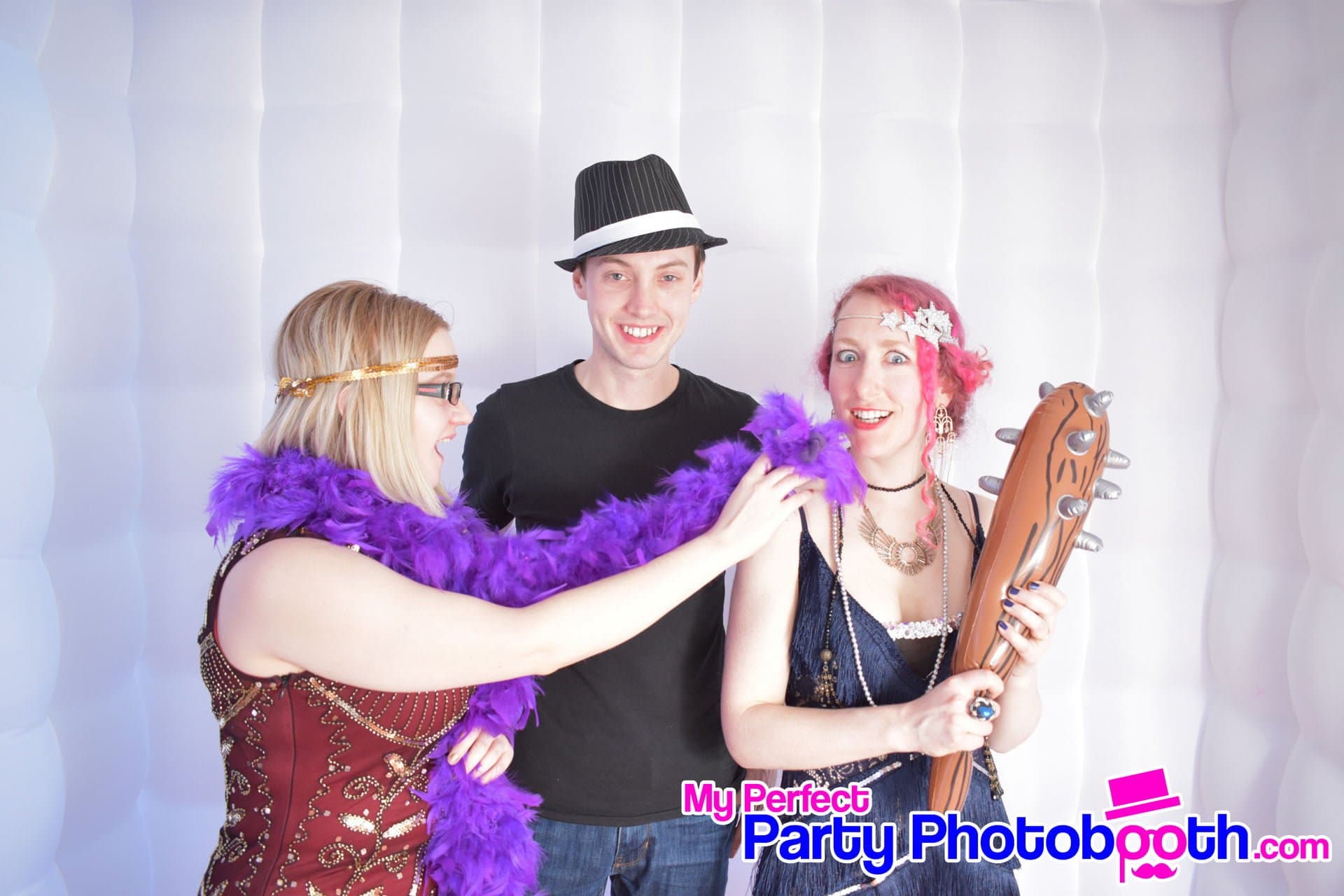 Guests at a Roaring 1920s-themed Christmas party