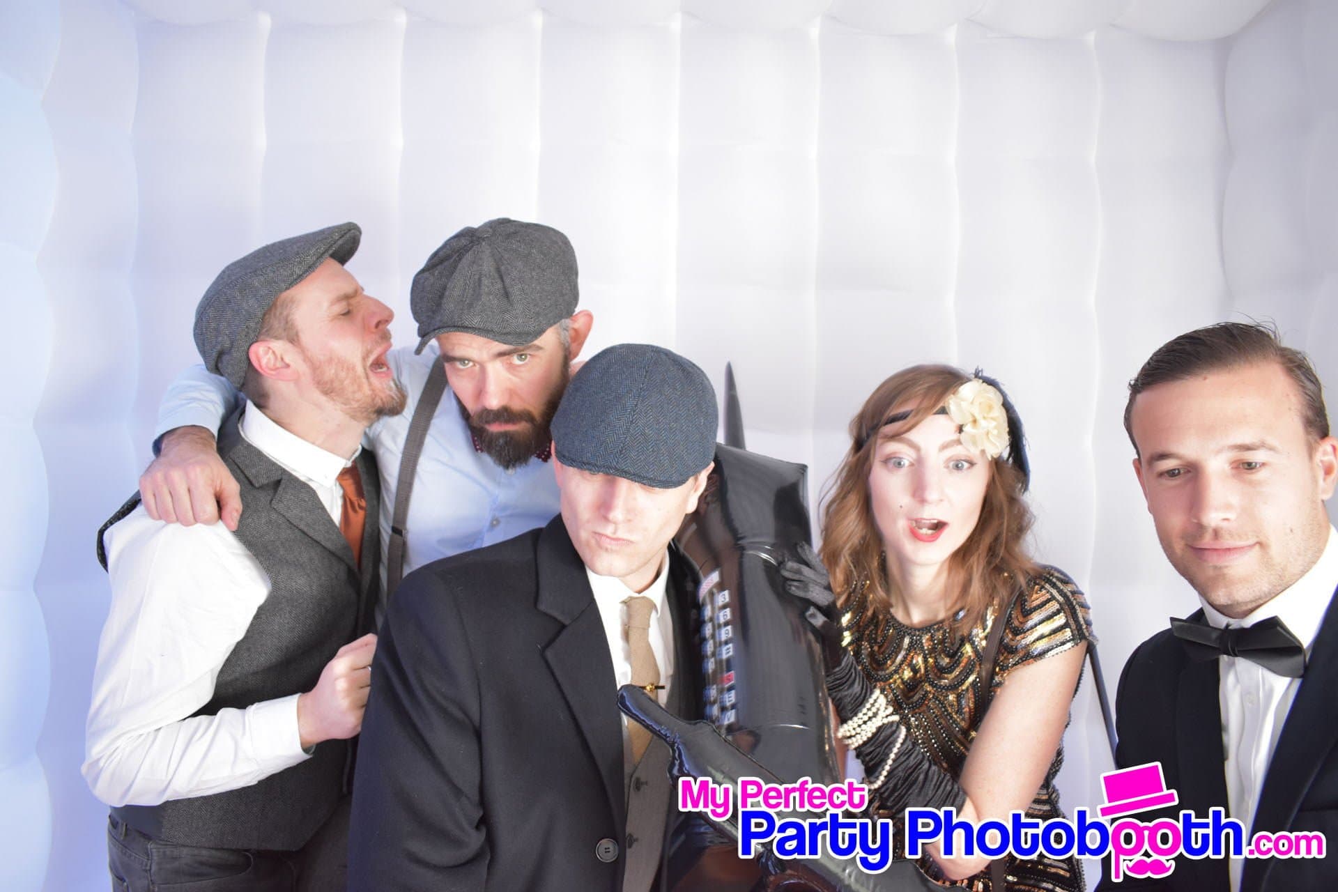 Guests at a Roaring 1920s-themed Christmas party