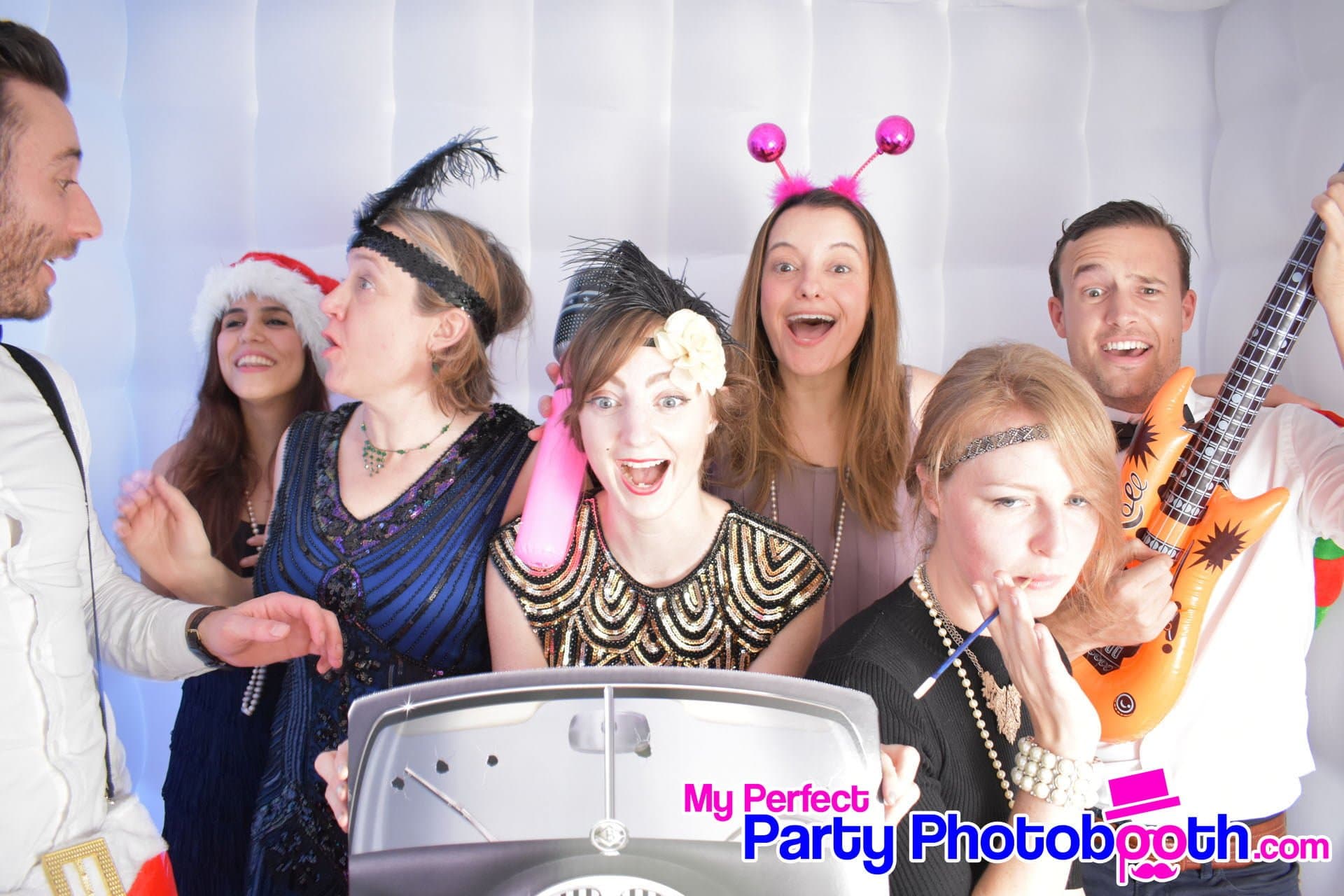 Guests at a Roaring 1920s-themed Christmas party