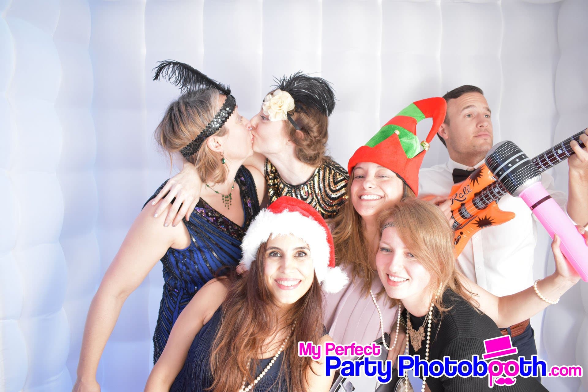 Guests at a Roaring 1920s-themed Christmas party