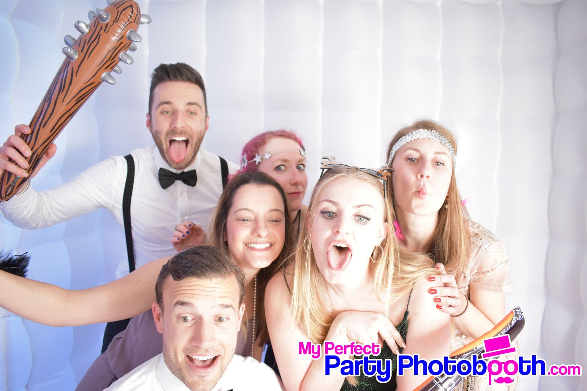 Guests at a Roaring 1920s-themed Christmas party