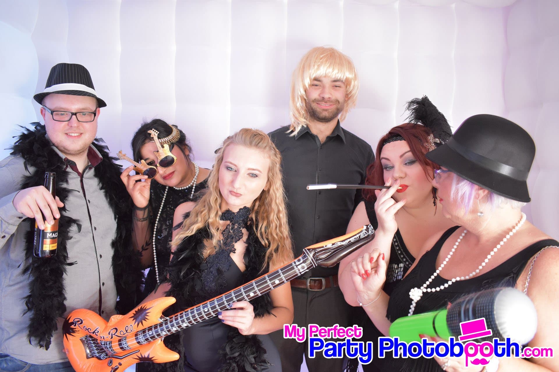 Guests at a Roaring 1920s-themed Christmas party