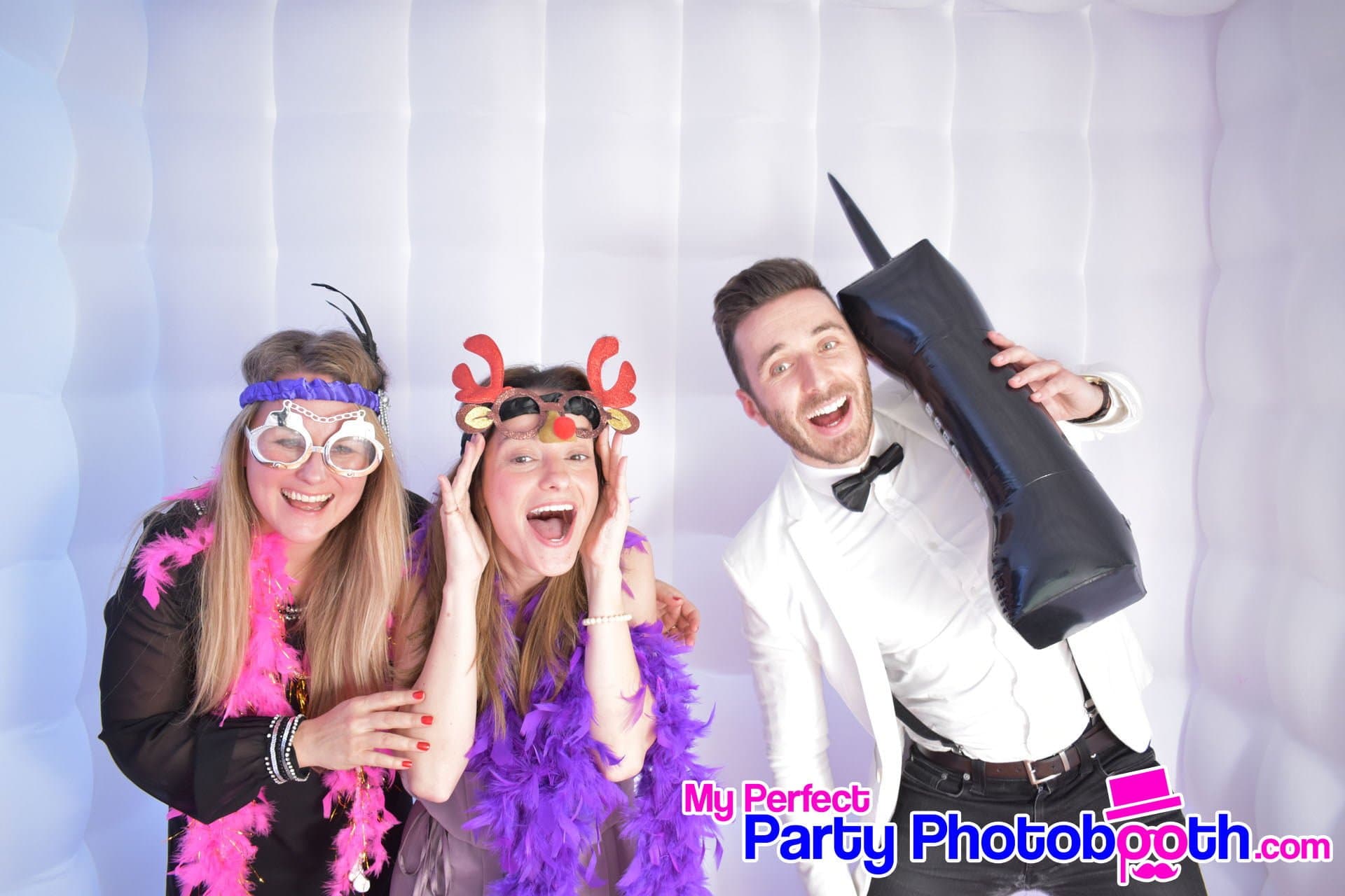 Guests at a Roaring 1920s-themed Christmas party