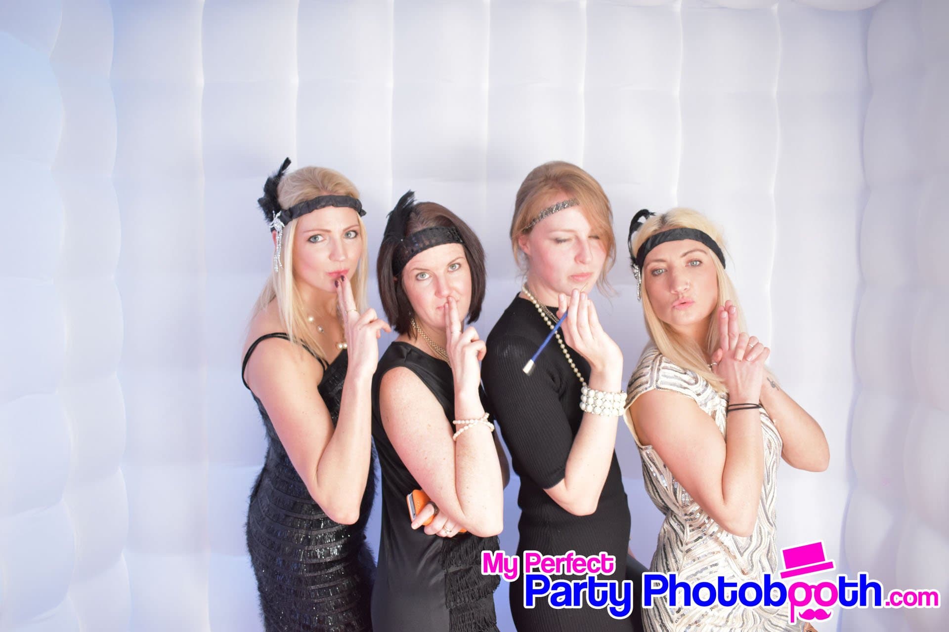 Guests at a Roaring 1920s-themed Christmas party
