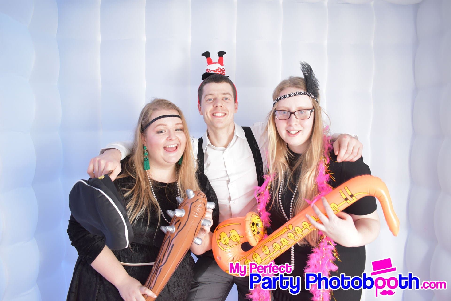 Guests at a Roaring 1920s-themed Christmas party